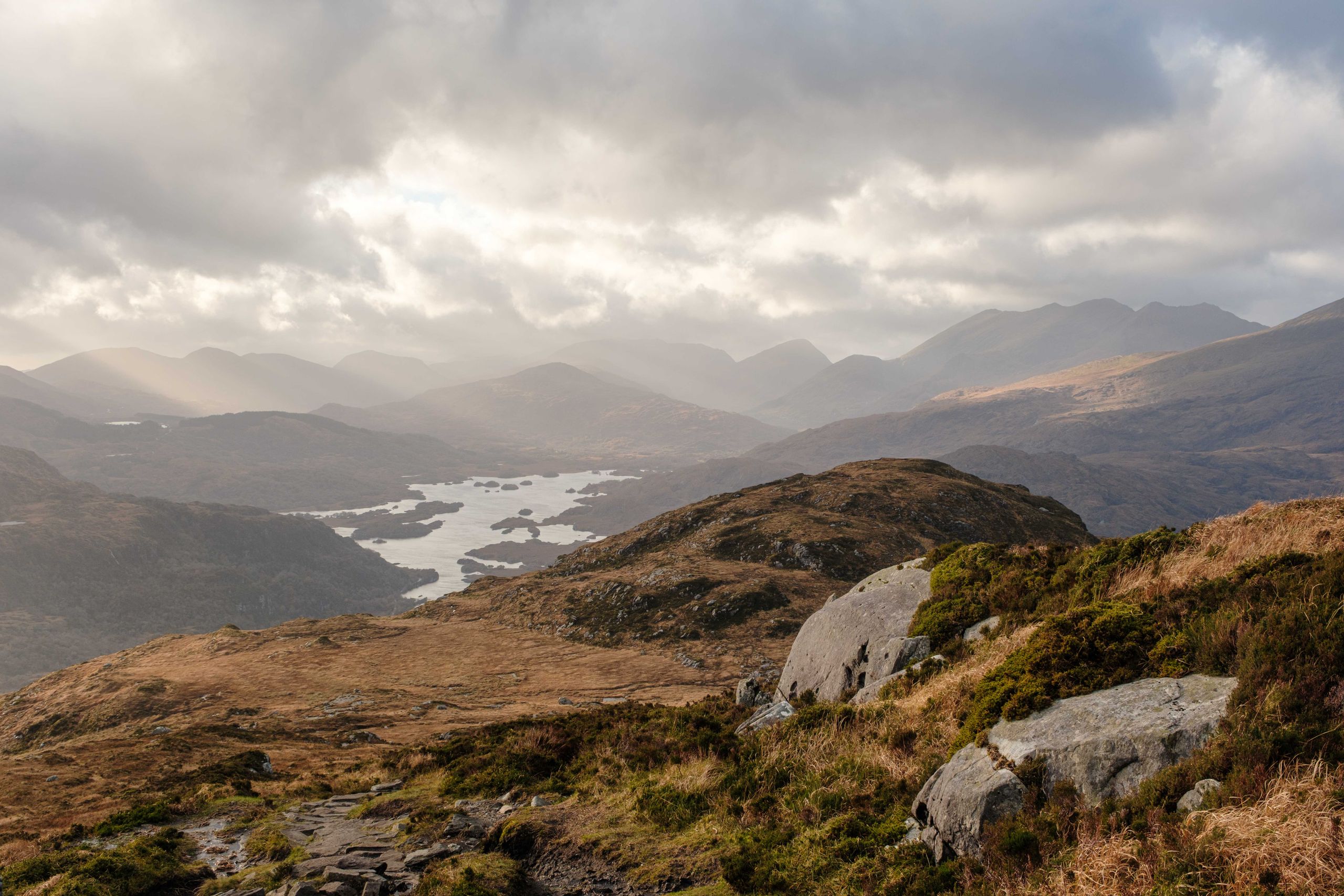 Misty mountain landscape over a lake in Killarney